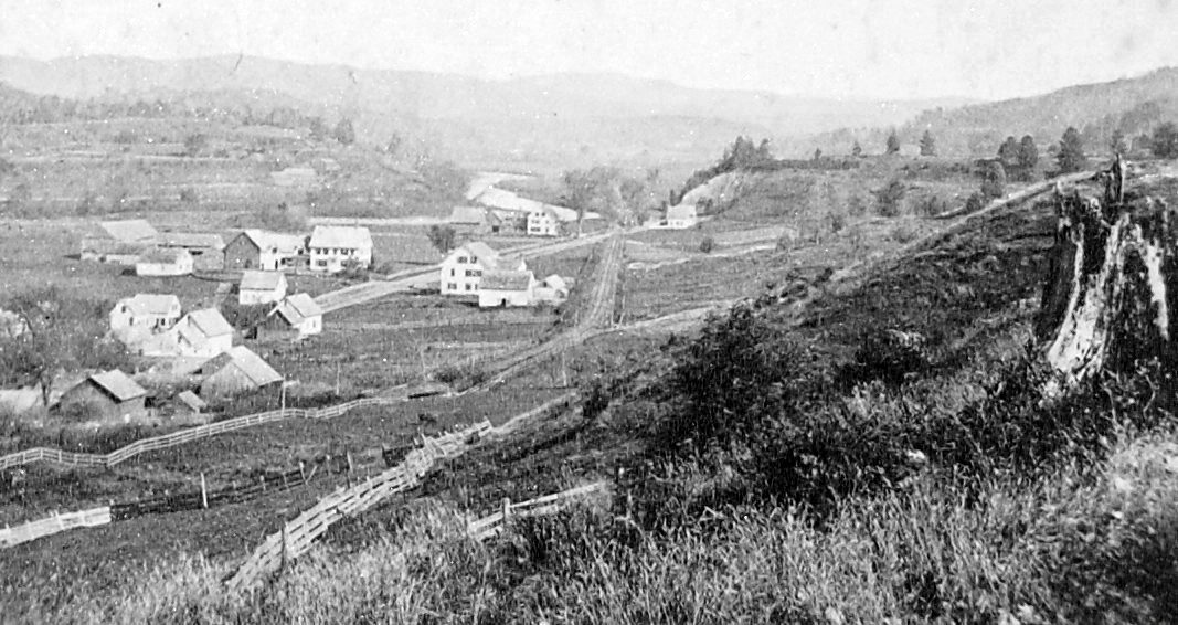 A black and white photo of the town of Lisbon from the hillside in 1880